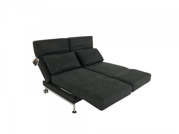 Brühl MOULE MEDIUM Sofa 2 im schwarzen Glove Leder und 2 Drehsitzen sowie Kufen mit Rollen hinten
