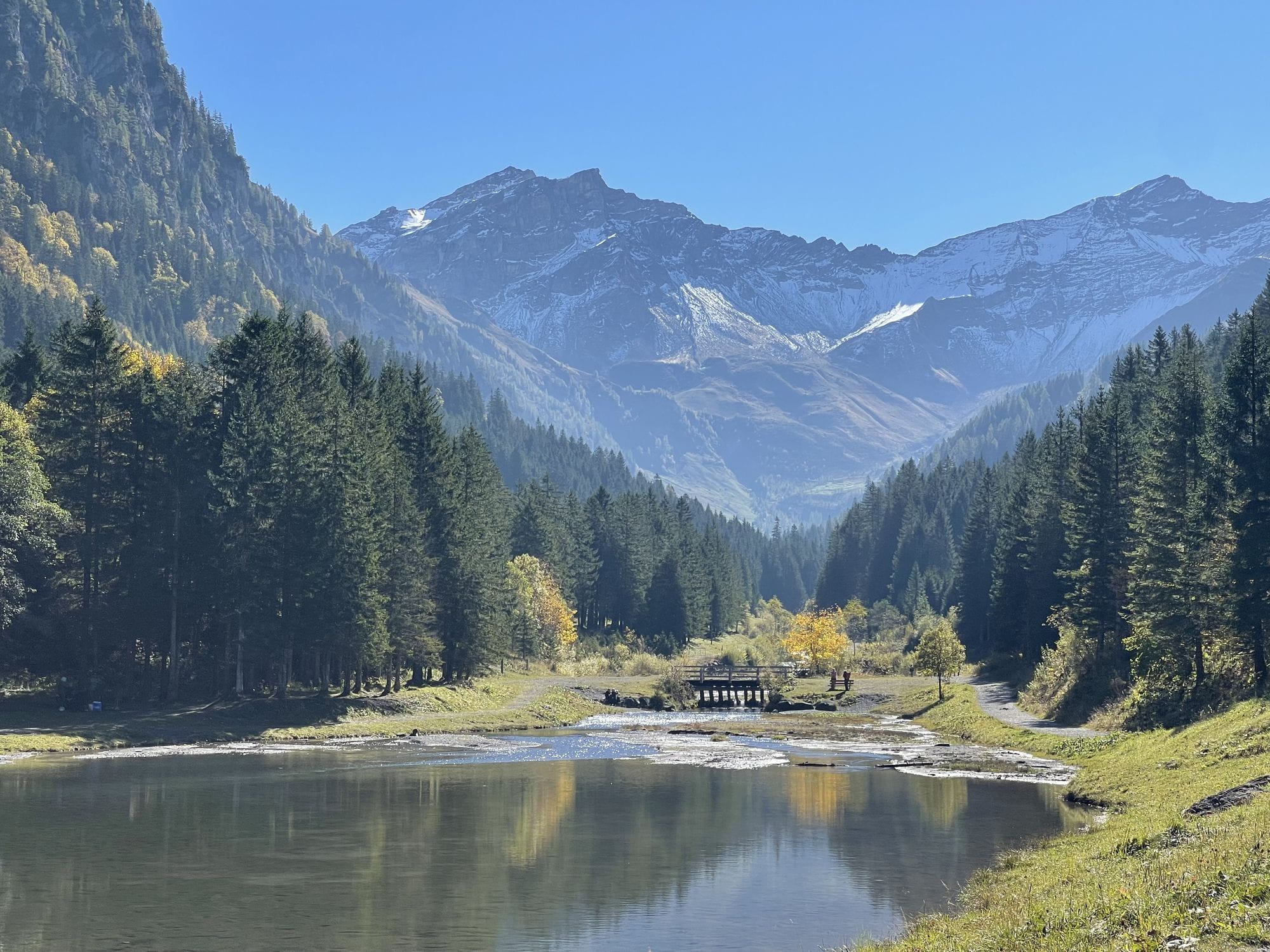 Mountain lake in Liechtenstein reflecting the alpine origin of Noir Alpine bespoke jewellery