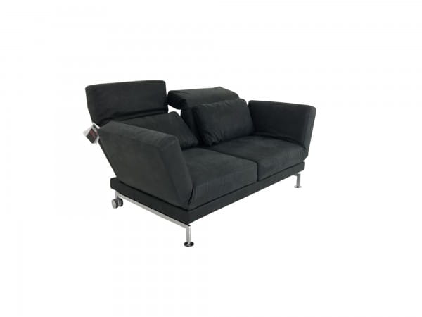 Brühl MOULE MEDIUM Sofa 2 im schwarzen Glove Leder und 2 Drehsitzen sowie Kufen mit Rollen hinten